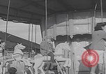 Image of children ride carousel Italy, 1950, second 18 stock footage video 65675080391
