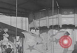 Image of children ride carousel Italy, 1950, second 25 stock footage video 65675080391