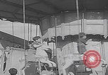 Image of children ride carousel Italy, 1950, second 27 stock footage video 65675080391