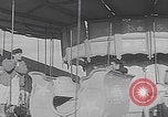 Image of children ride carousel Italy, 1950, second 28 stock footage video 65675080391