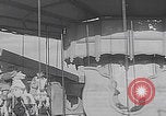 Image of children ride carousel Italy, 1950, second 32 stock footage video 65675080391