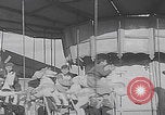 Image of children ride carousel Italy, 1950, second 33 stock footage video 65675080391