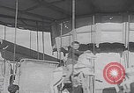 Image of children ride carousel Italy, 1950, second 40 stock footage video 65675080391