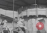 Image of children ride carousel Italy, 1950, second 42 stock footage video 65675080391