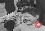 Image of children ride carousel Italy, 1950, second 47 stock footage video 65675080391