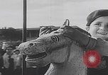 Image of children ride carousel Italy, 1950, second 48 stock footage video 65675080391