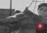 Image of children ride carousel Italy, 1950, second 50 stock footage video 65675080391
