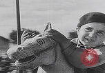Image of children ride carousel Italy, 1950, second 56 stock footage video 65675080391