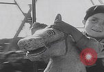 Image of children ride carousel Italy, 1950, second 57 stock footage video 65675080391