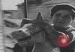Image of children ride carousel Italy, 1950, second 58 stock footage video 65675080391