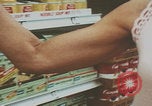 Image of supermarket shopping New York United States USA, 1968, second 19 stock footage video 65675080416