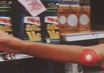 Image of supermarket shopping New York United States USA, 1968, second 28 stock footage video 65675080416