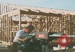 Image of tree cutting United States USA, 1968, second 20 stock footage video 65675080419