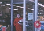 Image of urbans stores and supermarket United States USA, 1968, second 17 stock footage video 65675080422