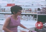 Image of urbans stores and supermarket United States USA, 1968, second 22 stock footage video 65675080422