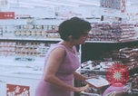 Image of urbans stores and supermarket United States USA, 1968, second 23 stock footage video 65675080422