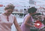 Image of urbans stores and supermarket United States USA, 1968, second 24 stock footage video 65675080422