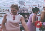 Image of urbans stores and supermarket United States USA, 1968, second 25 stock footage video 65675080422