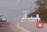 Image of cars drive highway United States USA, 1968, second 4 stock footage video 65675080425