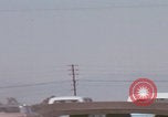 Image of cars drive highway United States USA, 1968, second 5 stock footage video 65675080425