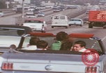Image of cars drive highway United States USA, 1968, second 8 stock footage video 65675080425