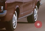 Image of cars drive highway United States USA, 1968, second 9 stock footage video 65675080425