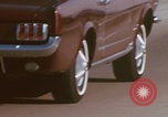 Image of cars drive highway United States USA, 1968, second 10 stock footage video 65675080425