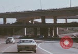 Image of cars drive highway United States USA, 1968, second 11 stock footage video 65675080425