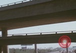 Image of cars drive highway United States USA, 1968, second 15 stock footage video 65675080425