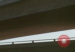 Image of cars drive highway United States USA, 1968, second 16 stock footage video 65675080425