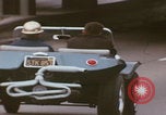 Image of cars drive highway United States USA, 1968, second 23 stock footage video 65675080425