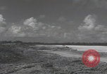 Image of Consolidated B-24 Liberator bombers landing Angaur Palau Islands, 1944, second 4 stock footage video 65675080435