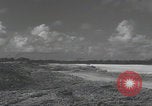 Image of Consolidated B-24 Liberator bombers landing Angaur Palau Islands, 1944, second 5 stock footage video 65675080435