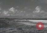 Image of Consolidated B-24 Liberator bombers landing Angaur Palau Islands, 1944, second 6 stock footage video 65675080435