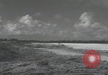 Image of Consolidated B-24 Liberator bombers landing Angaur Palau Islands, 1944, second 7 stock footage video 65675080435