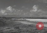 Image of Consolidated B-24 Liberator bombers landing Angaur Palau Islands, 1944, second 9 stock footage video 65675080435