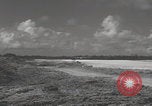 Image of Consolidated B-24 Liberator bombers landing Angaur Palau Islands, 1944, second 10 stock footage video 65675080435