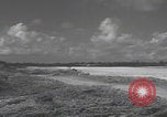 Image of Consolidated B-24 Liberator bombers landing Angaur Palau Islands, 1944, second 12 stock footage video 65675080435