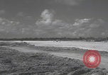 Image of Consolidated B-24 Liberator bombers landing Angaur Palau Islands, 1944, second 16 stock footage video 65675080435