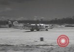 Image of Consolidated B-24 Liberator bombers landing Angaur Palau Islands, 1944, second 25 stock footage video 65675080435