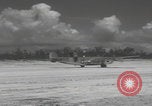 Image of Consolidated B-24 Liberator bombers landing Angaur Palau Islands, 1944, second 28 stock footage video 65675080435