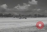 Image of Consolidated B-24 Liberator bombers landing Angaur Palau Islands, 1944, second 29 stock footage video 65675080435