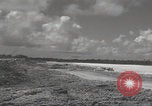 Image of Consolidated B-24 Liberator bombers landing Angaur Palau Islands, 1944, second 32 stock footage video 65675080435