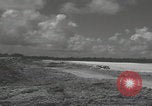 Image of Consolidated B-24 Liberator bombers landing Angaur Palau Islands, 1944, second 34 stock footage video 65675080435