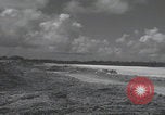 Image of Consolidated B-24 Liberator bombers landing Angaur Palau Islands, 1944, second 35 stock footage video 65675080435