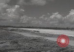Image of Consolidated B-24 Liberator bombers landing Angaur Palau Islands, 1944, second 42 stock footage video 65675080435