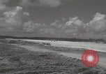 Image of Consolidated B-24 Liberator bombers landing Angaur Palau Islands, 1944, second 43 stock footage video 65675080435