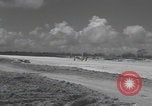 Image of Consolidated B-24 Liberator bombers landing Angaur Palau Islands, 1944, second 47 stock footage video 65675080435