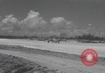 Image of Consolidated B-24 Liberator bombers landing Angaur Palau Islands, 1944, second 49 stock footage video 65675080435