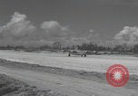 Image of Consolidated B-24 Liberator bombers landing Angaur Palau Islands, 1944, second 50 stock footage video 65675080435